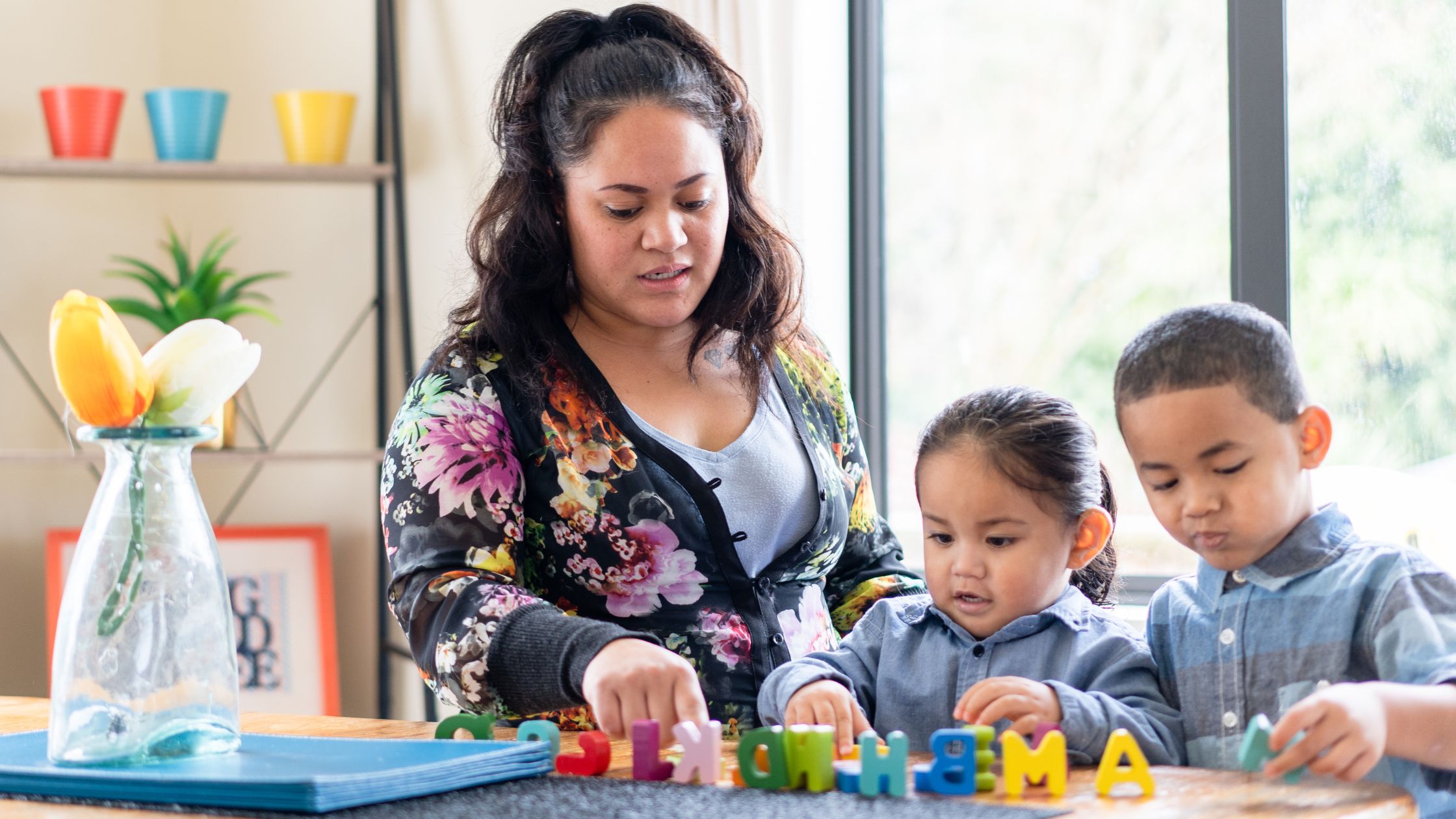 Healthy Maori family with mom and children